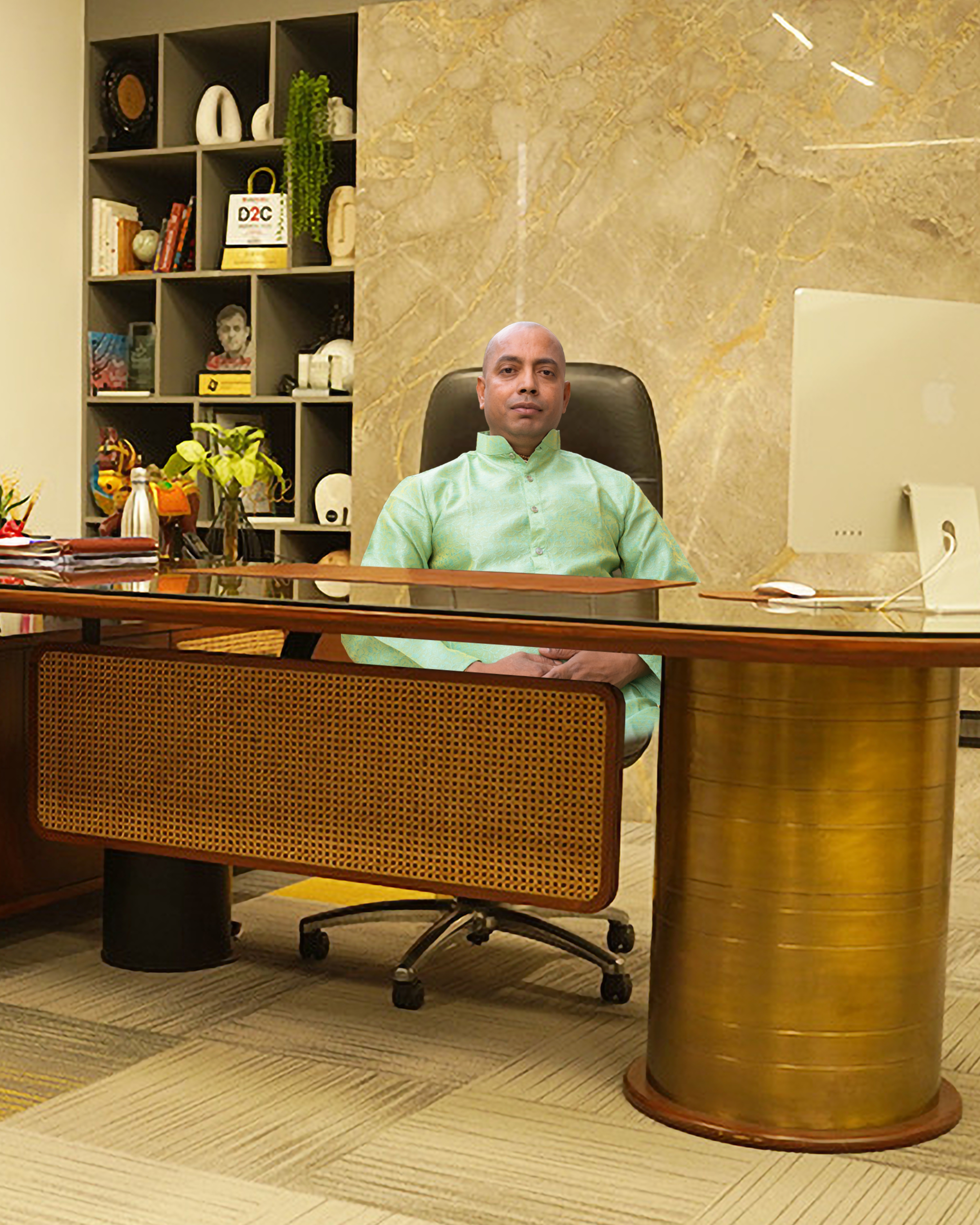 Dr. Jagannath Acharya seated in an office setting